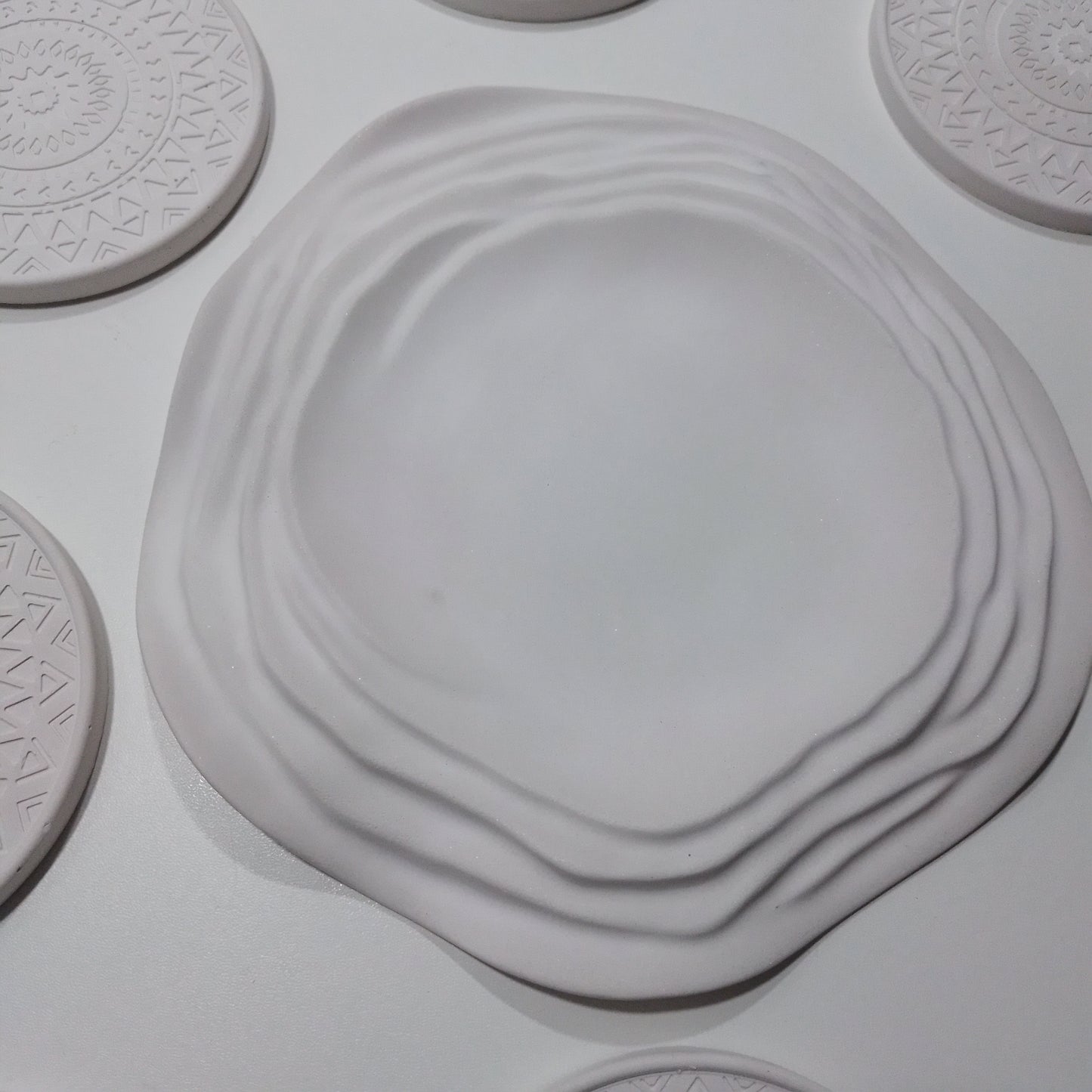 52.1 Seis porta-copos +Um prato de sobremesa:cimento artesanal