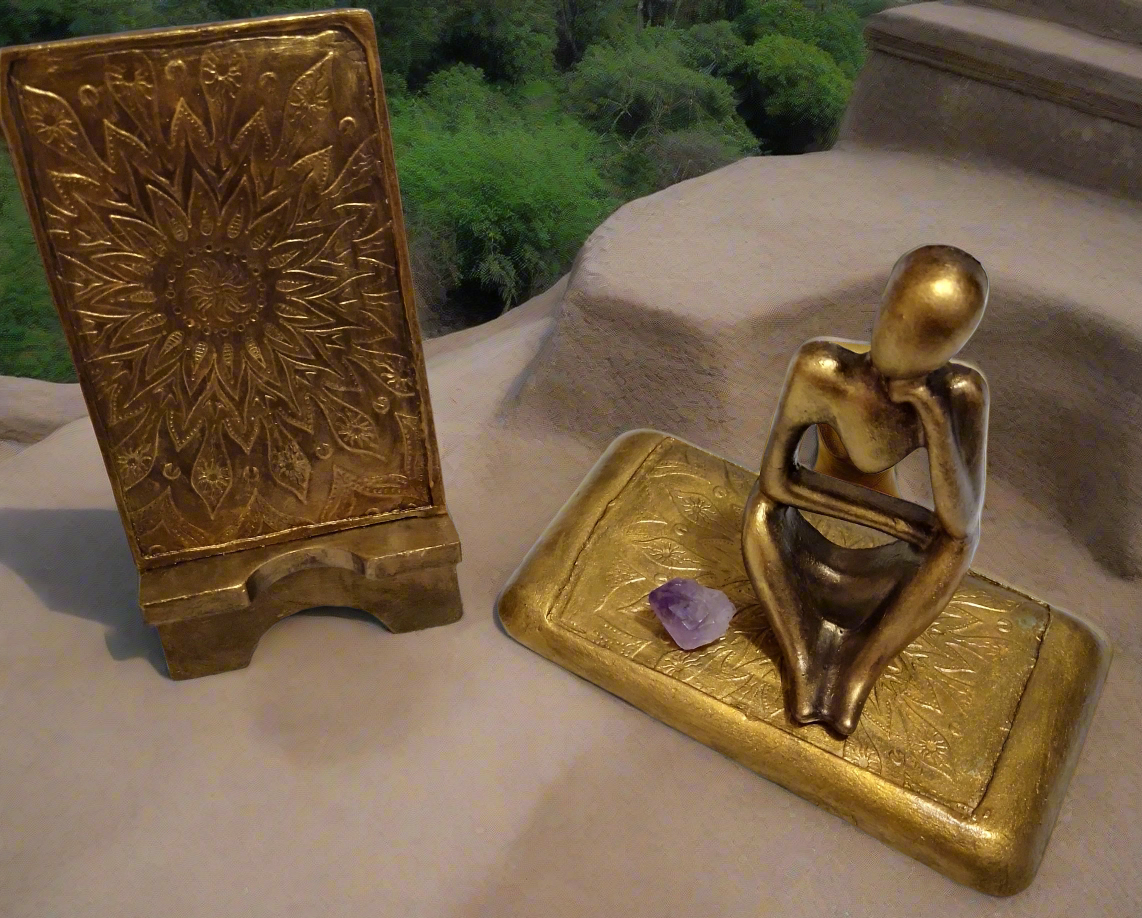 Porta-celular +Estatueta