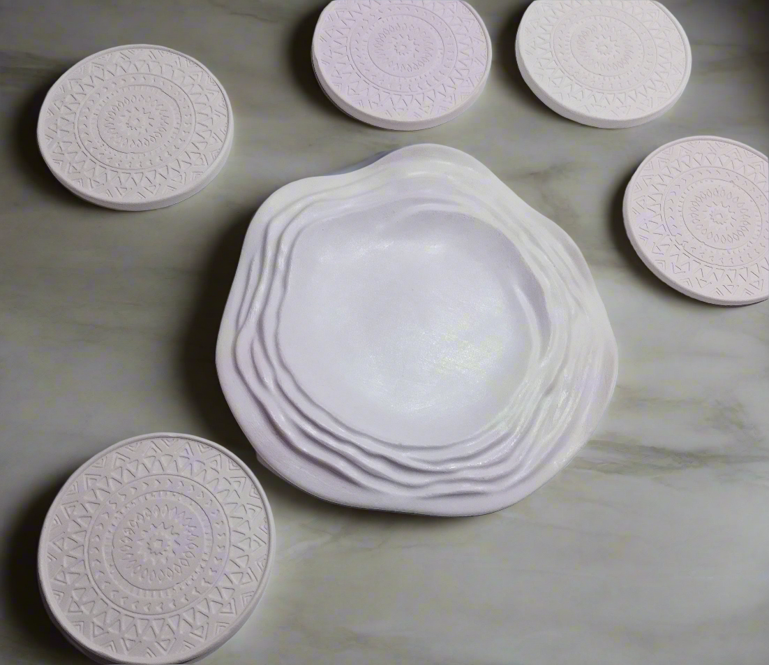 Seis porta-copos +Um prato de sobremesa:cimento artesanal