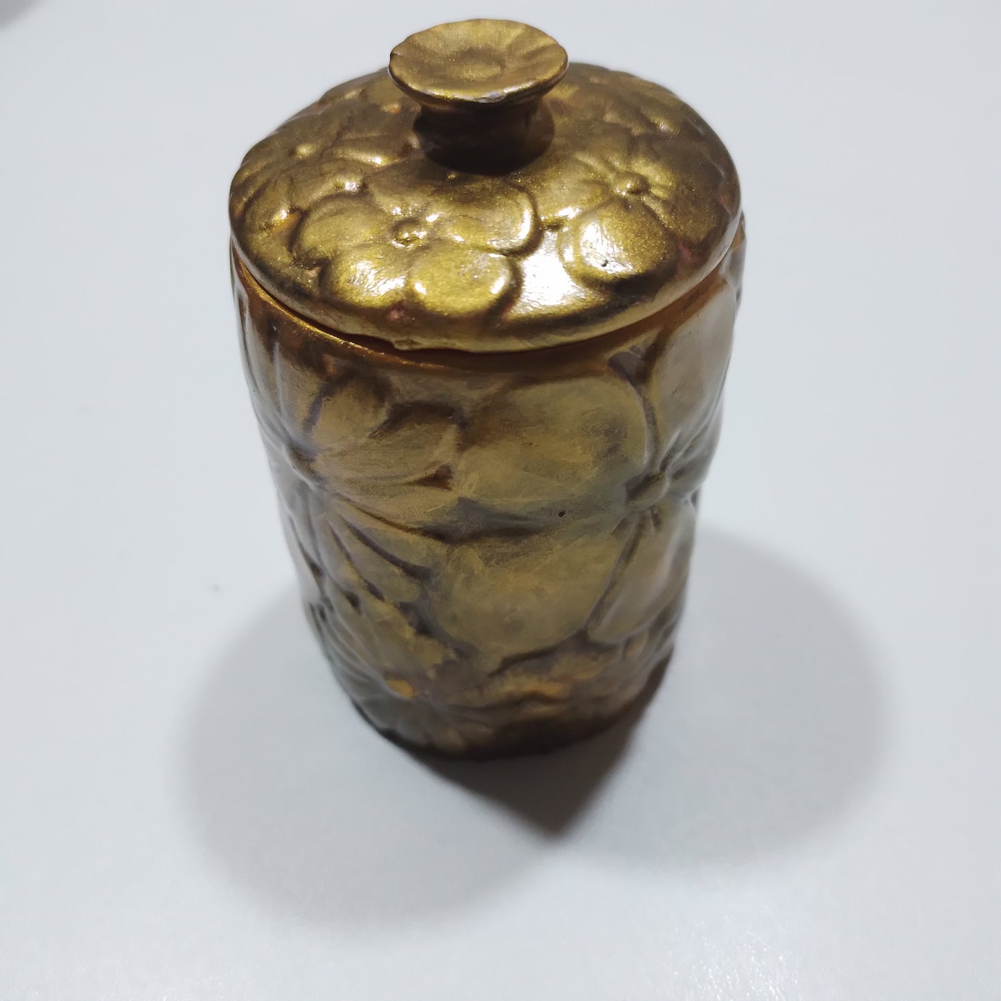 1.Recipiente: Flores Douradas